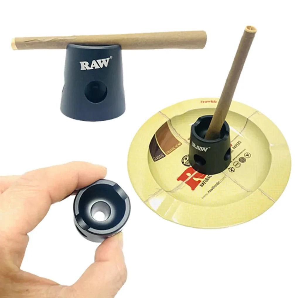 Raw magnetic metal cigarette snuffer attached to a metal ashtray for safely extinguishing cigarettes.